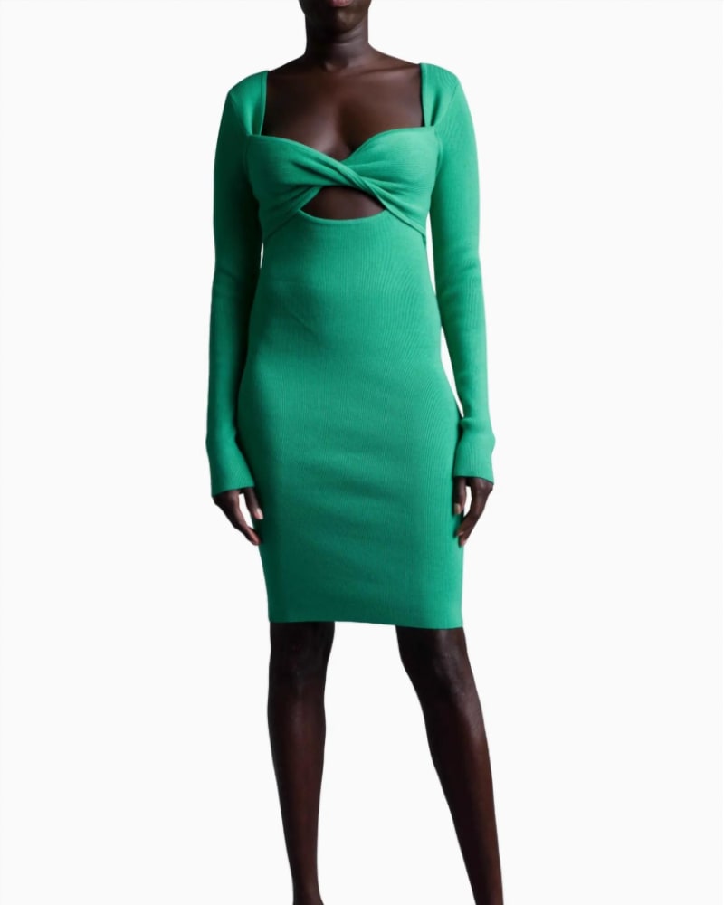 Front of a model wearing a size L Retrograde Twist Front Long Sleeve Knit Dress in Emerald in Emerald by LE SUPERBE. | dia_product_style_image_id:337457